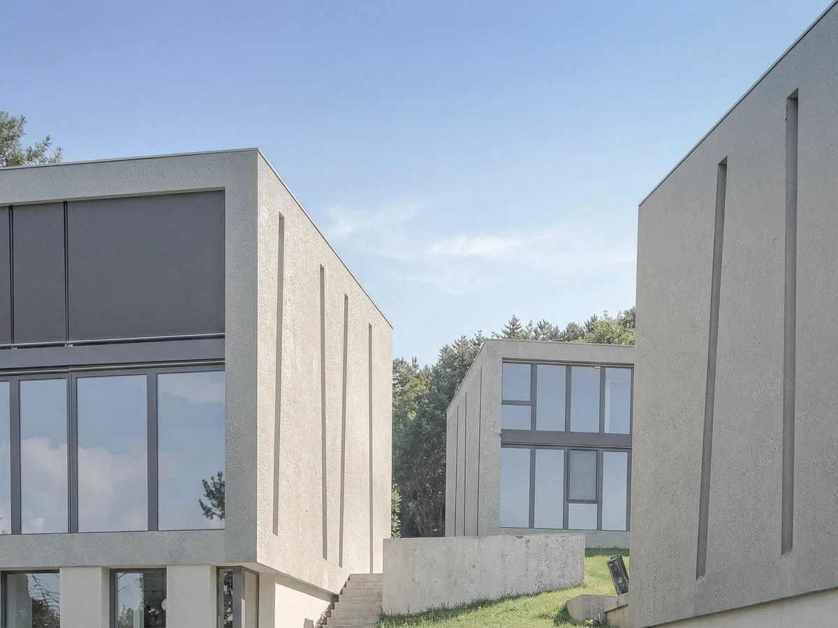 Versetzt angeordnete Betonhäuser der Überbauung like2live in Winterthur